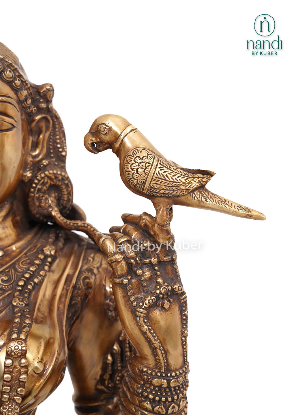 Decorative brass lady statue with a bird on her shoulder, standing on a carved round base with intricate handcrafted detailing.
