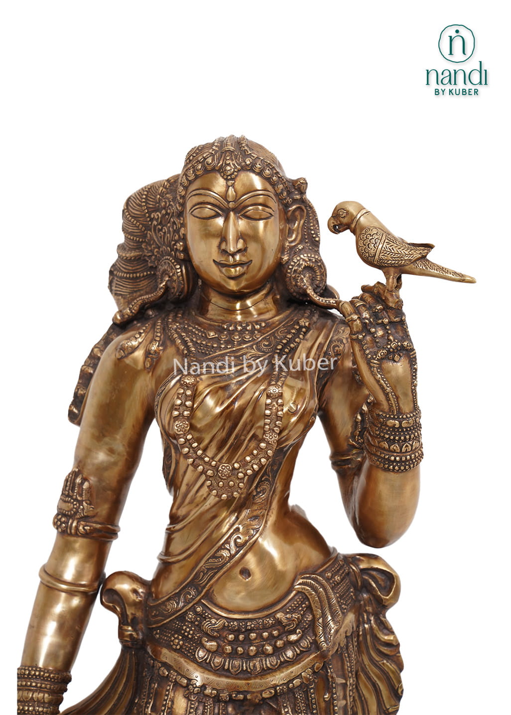 Decorative brass lady statue with a bird on her shoulder, standing on a carved round base with intricate handcrafted detailing.