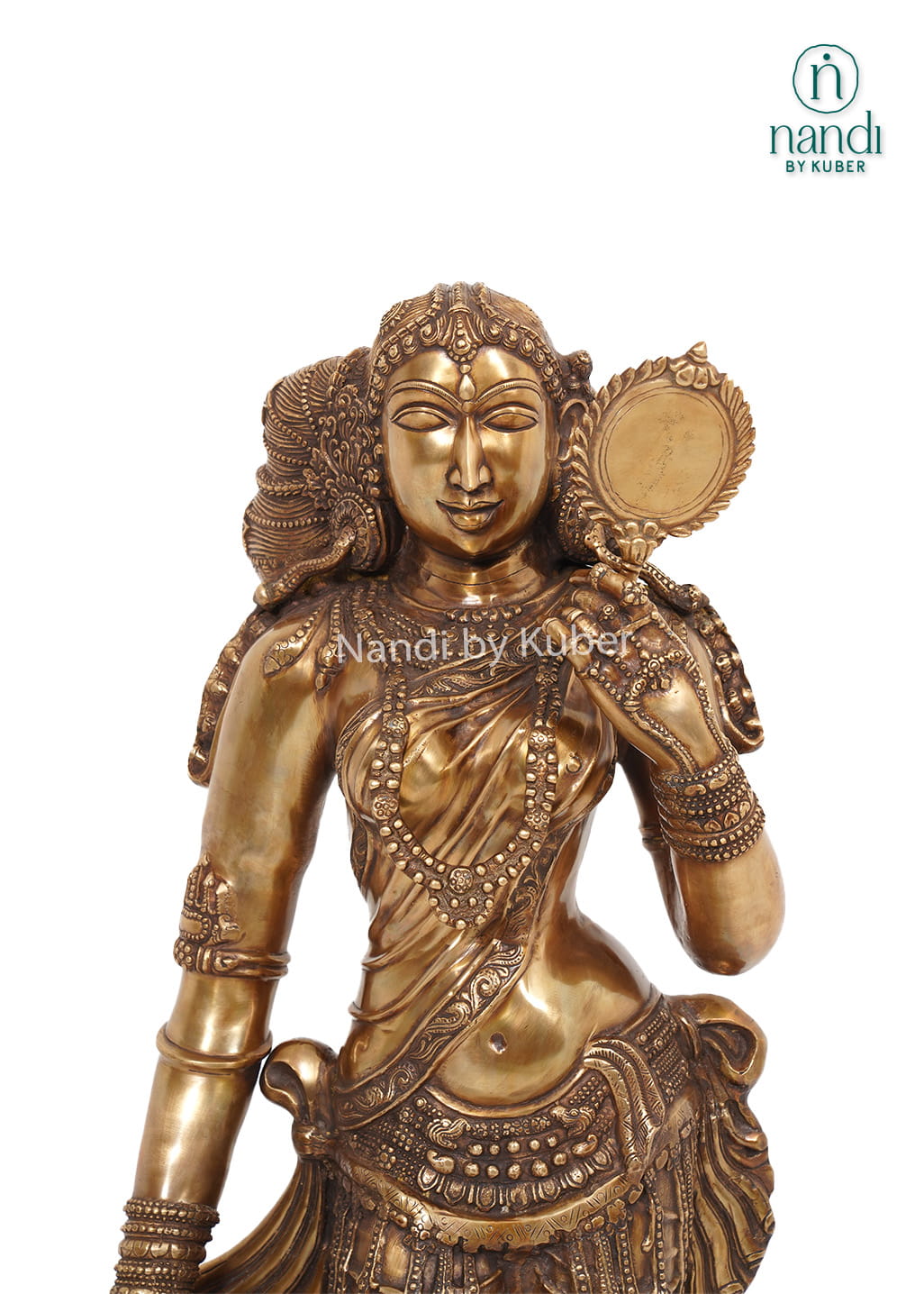 Decorative brass lady statue holding a mirror, standing on a carved round base with intricate handcrafted detailing.