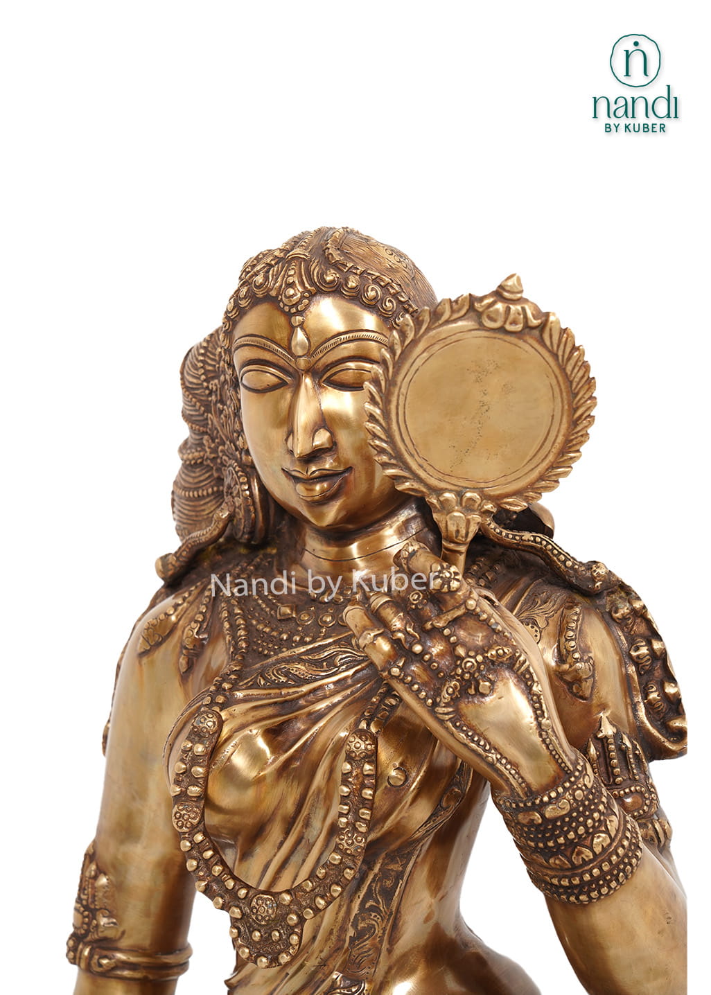 Decorative brass lady statue holding a mirror, standing on a carved round base with intricate handcrafted detailing.