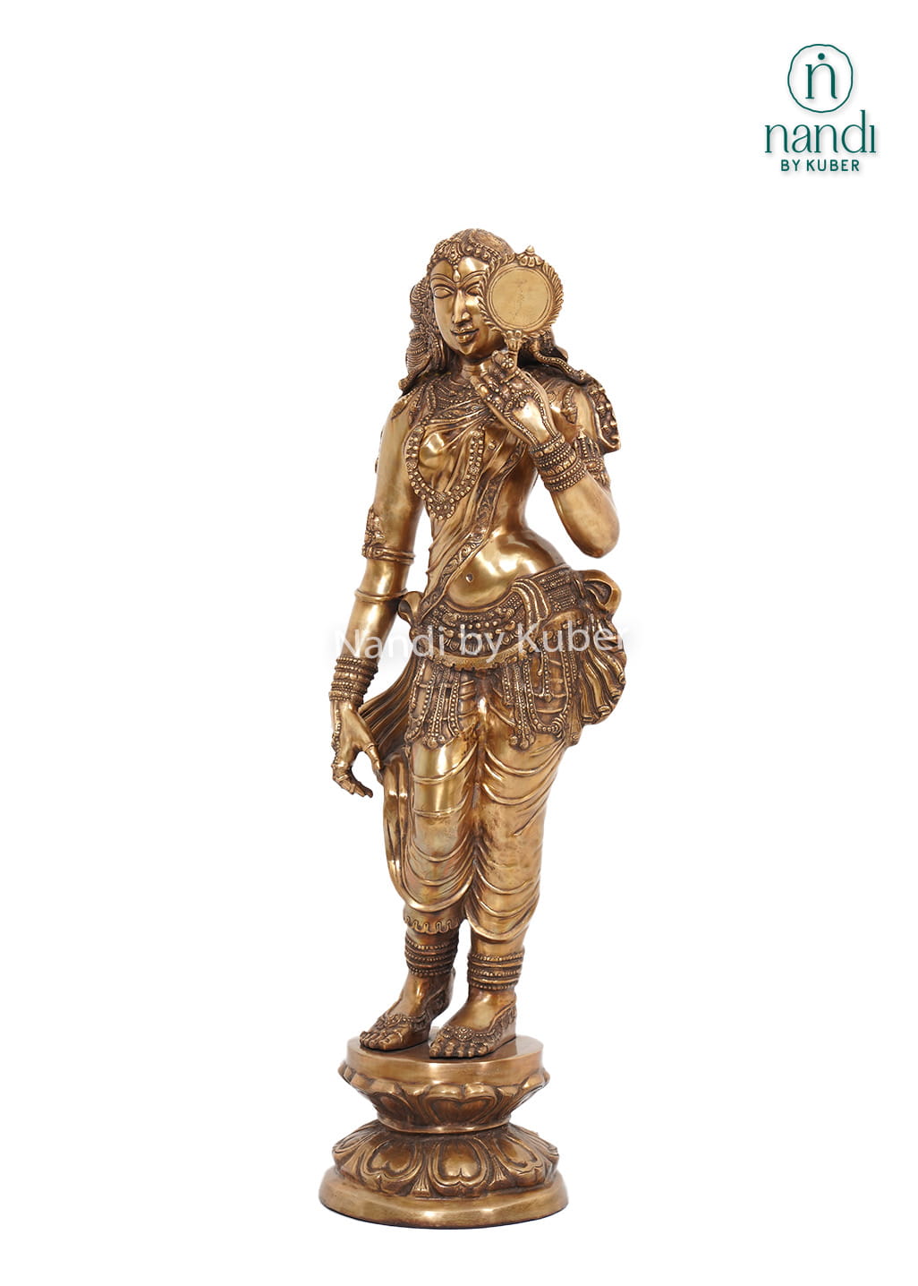 Decorative brass lady statue holding a mirror, standing on a carved round base with intricate handcrafted detailing.