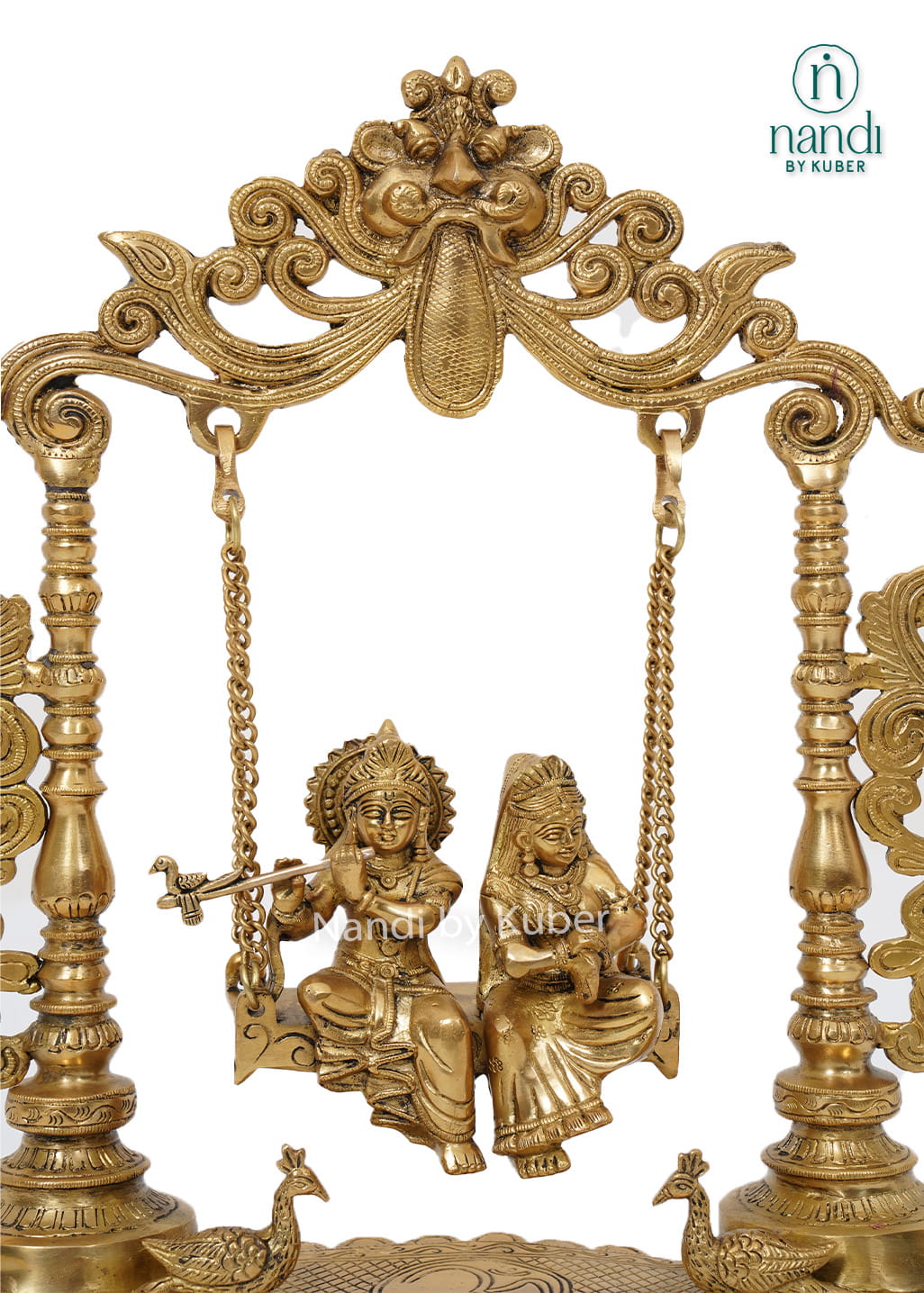 Traditional brass Radha Krishna Jhula featuring intricately carved pillars and a decorative swing for home temples and spiritual décor.