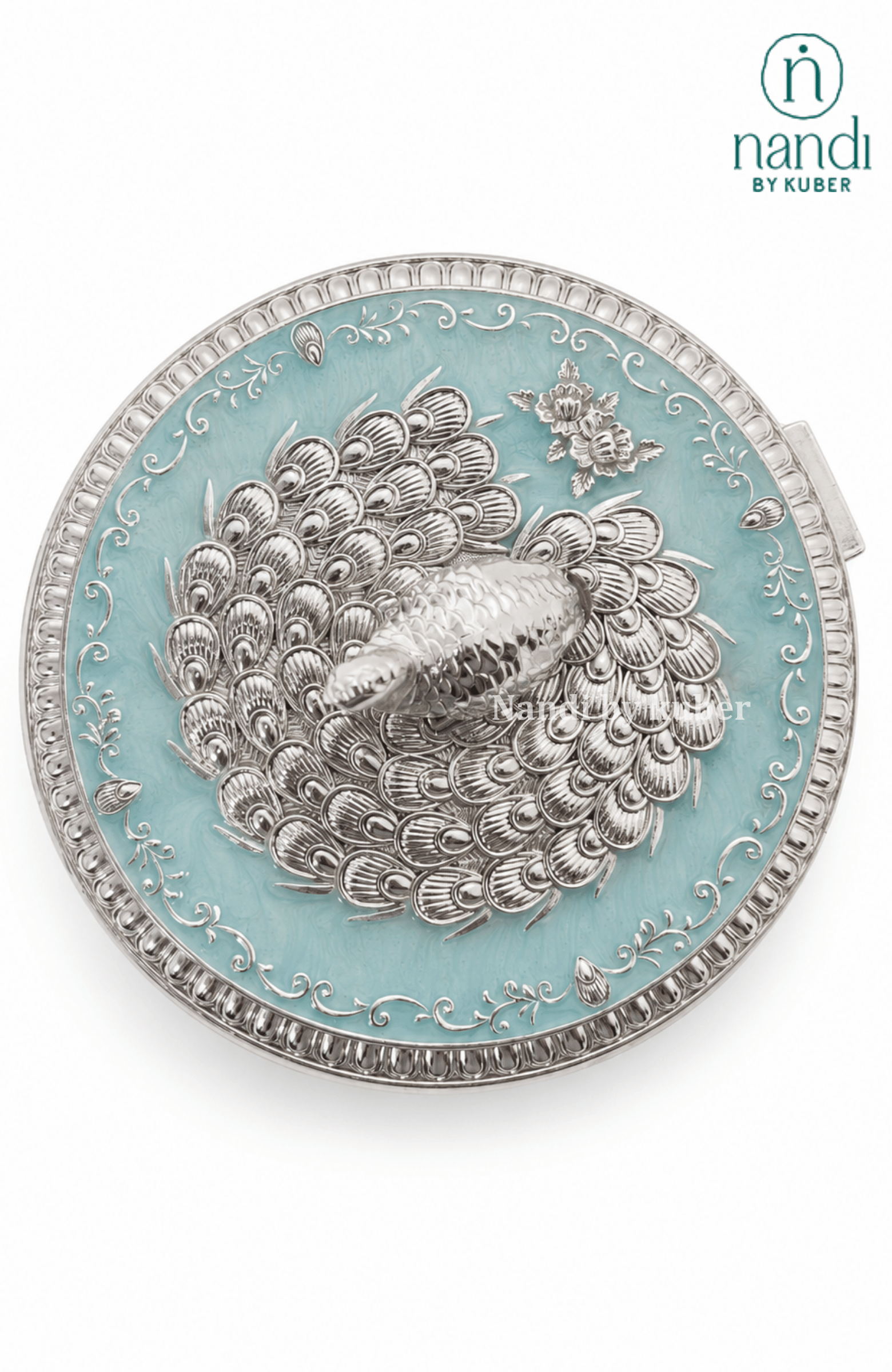 Handcrafted brass peacock round box in turquoise, with filigree work, ideal for jewelry storage, pooja essentials, home décor gifting, and tabletop display.