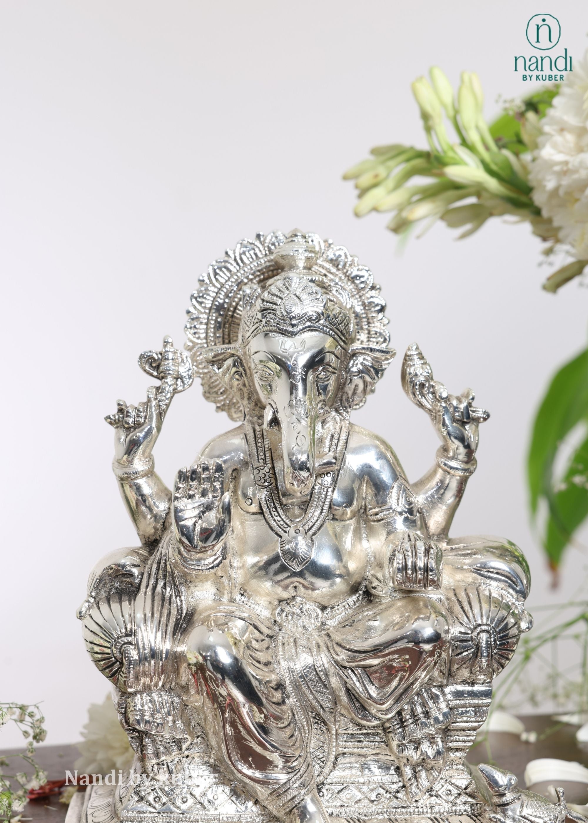 Brass Ganesha Sitting On Singhasan - side view