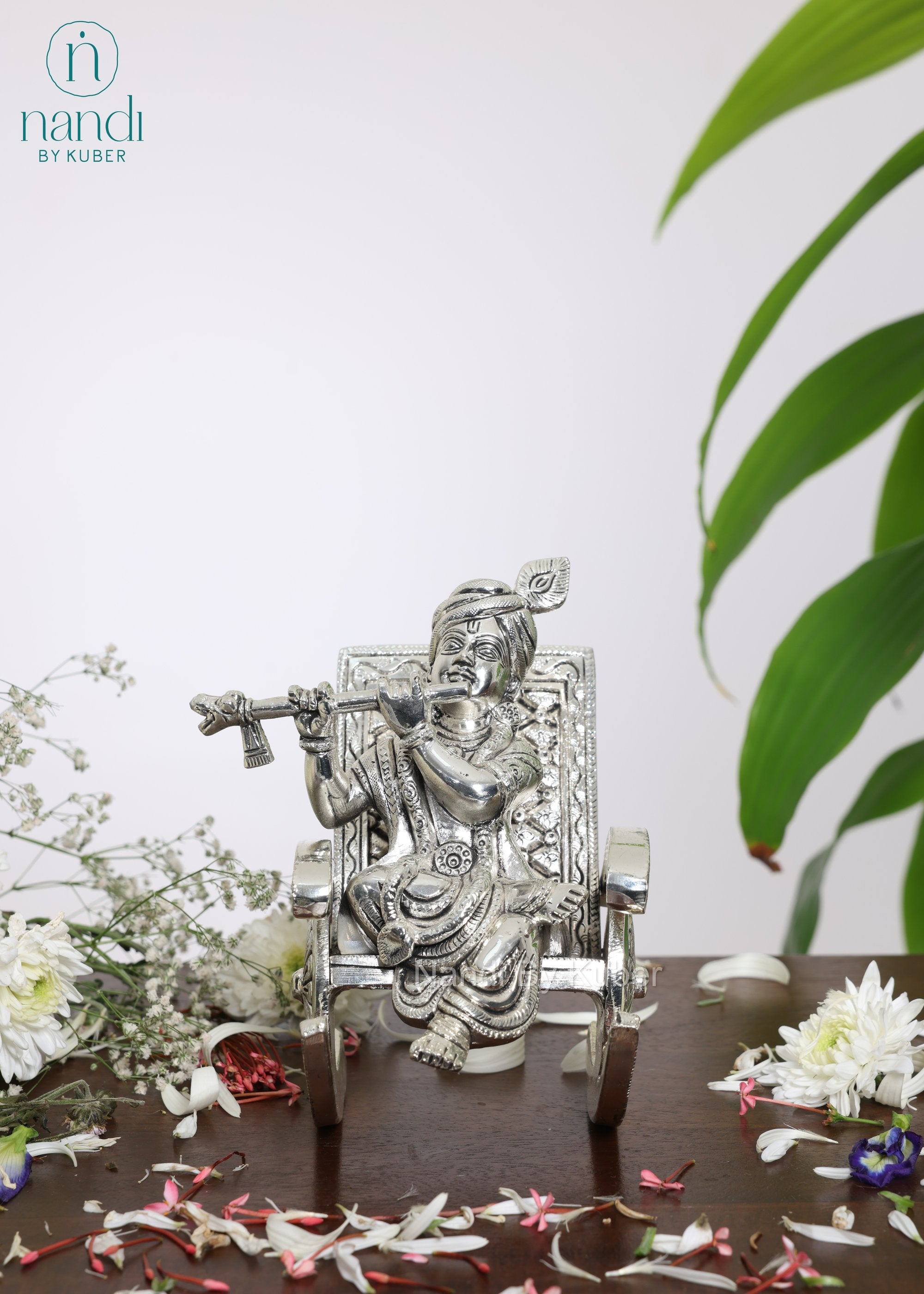 Brass Special Silver Plating Krishna Sitting On Rocking Chair - front view