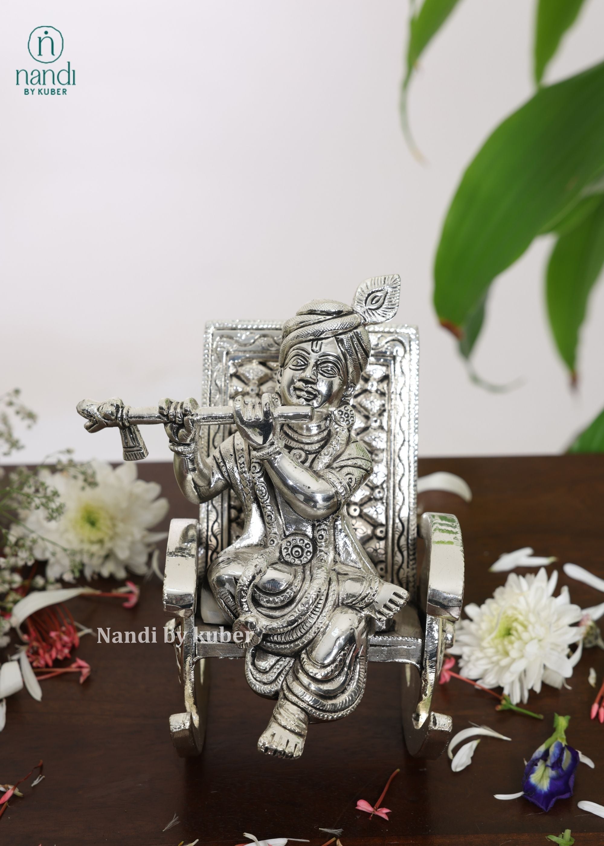 Brass Special Silver Plating Krishna Sitting On Rocking Chair - side view