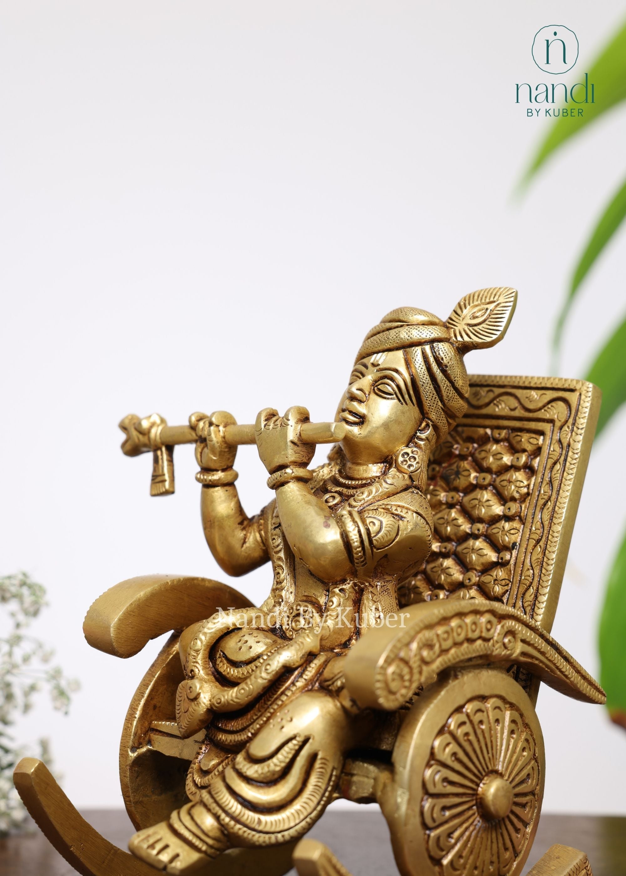 Brass Krishna Sitting On Rocking Chair - front view
