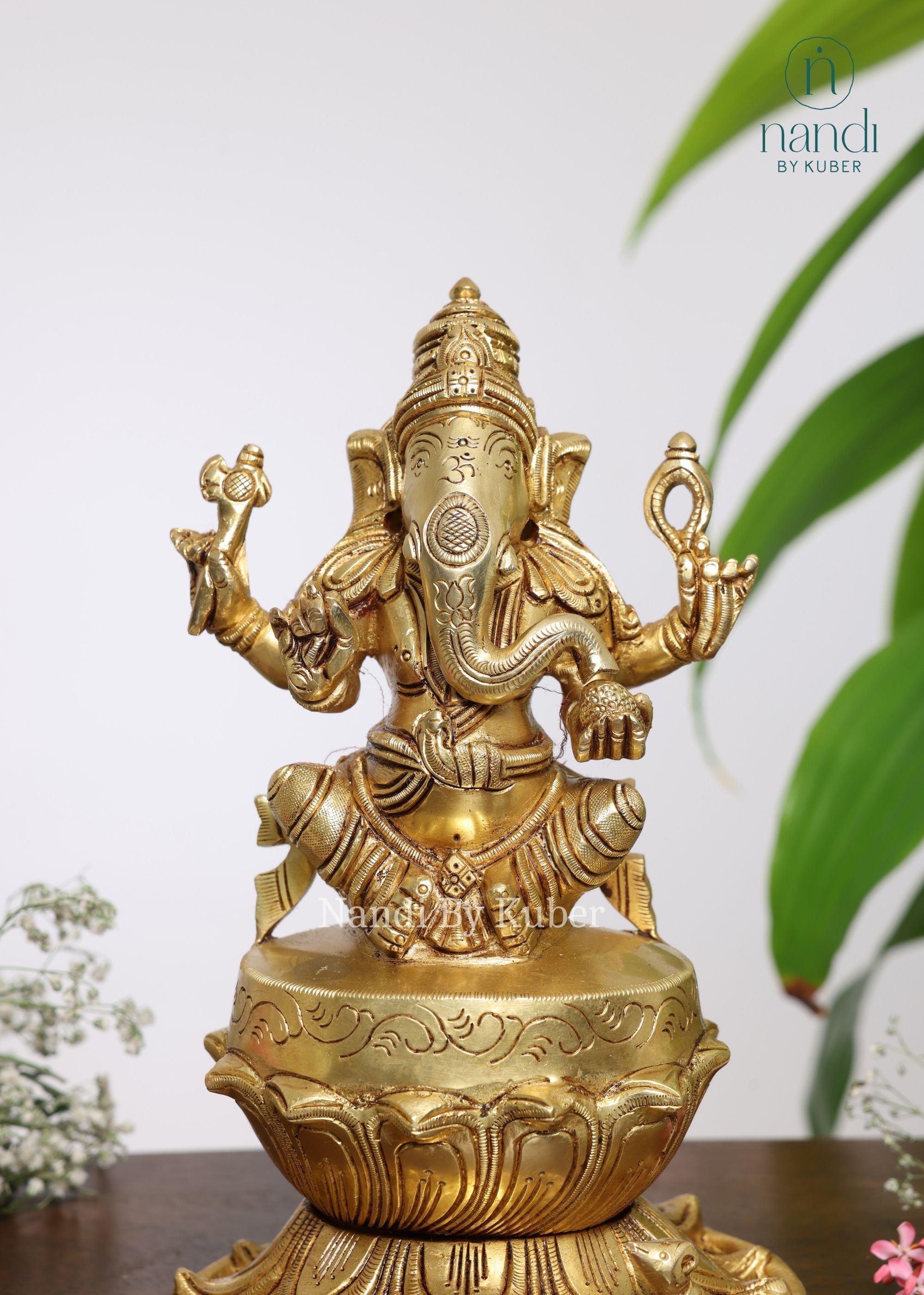 Brass Ganesha Sitting On Lotus Base - side view