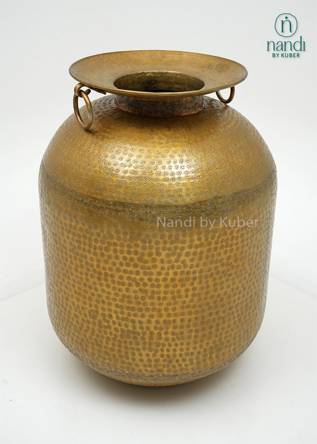 Decorative hammered aluminium planter vase with an antique gold finish, perfect for displaying plants and enhancing modern or rustic interiors.
