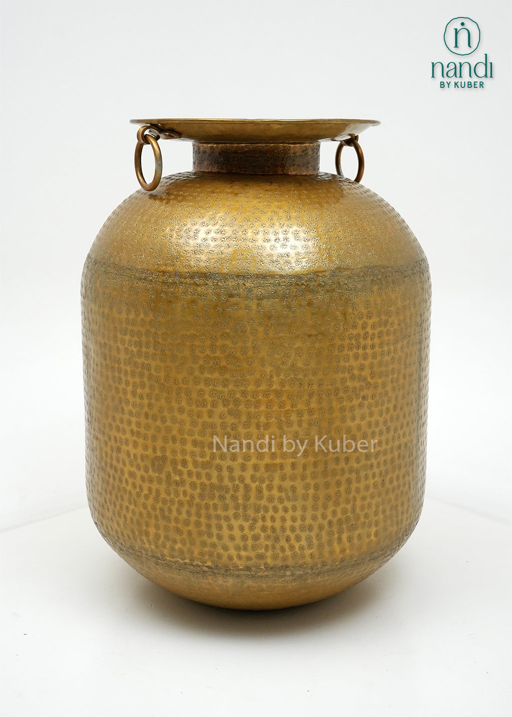 Decorative hammered aluminium planter vase with an antique gold finish, perfect for displaying plants and enhancing modern or rustic interiors.