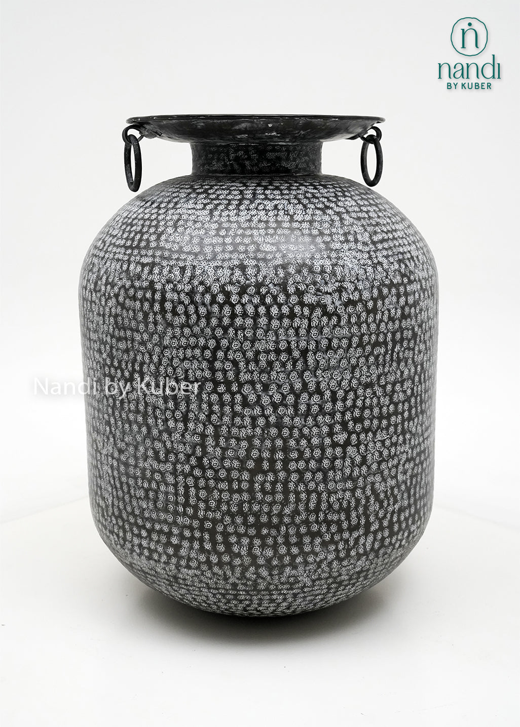 Decorative hammered aluminium planter vase with an antique smoke finish, perfect for displaying plants and enhancing modern or rustic interiors.