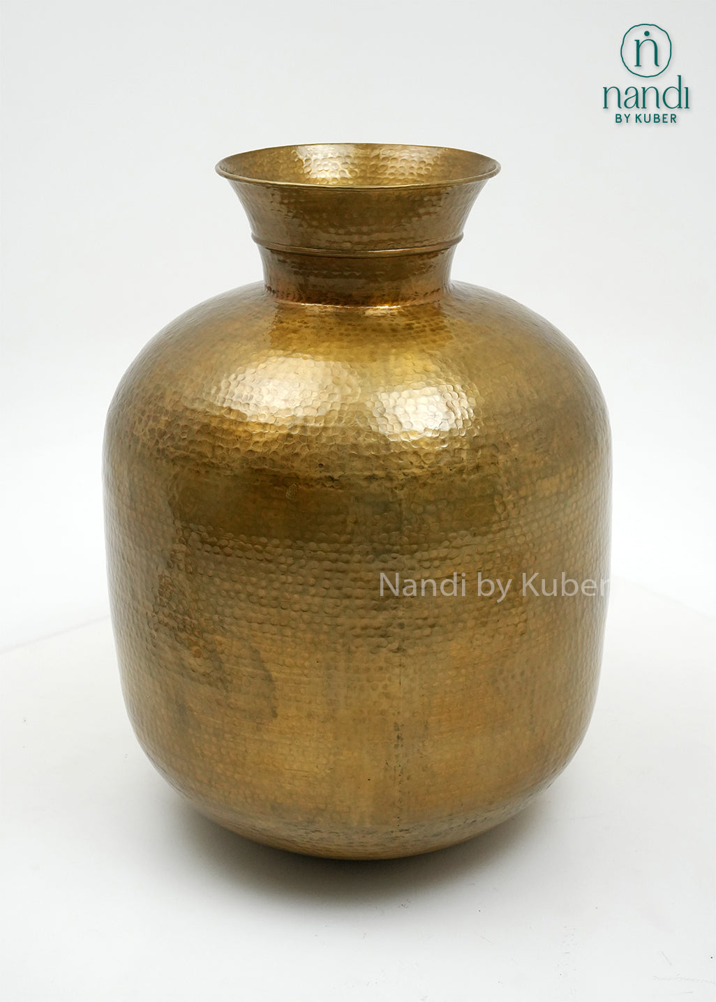 Decorative hammered aluminium planter vase with an antique  gold finish, perfect for displaying plants and enhancing modern or rustic interiors.