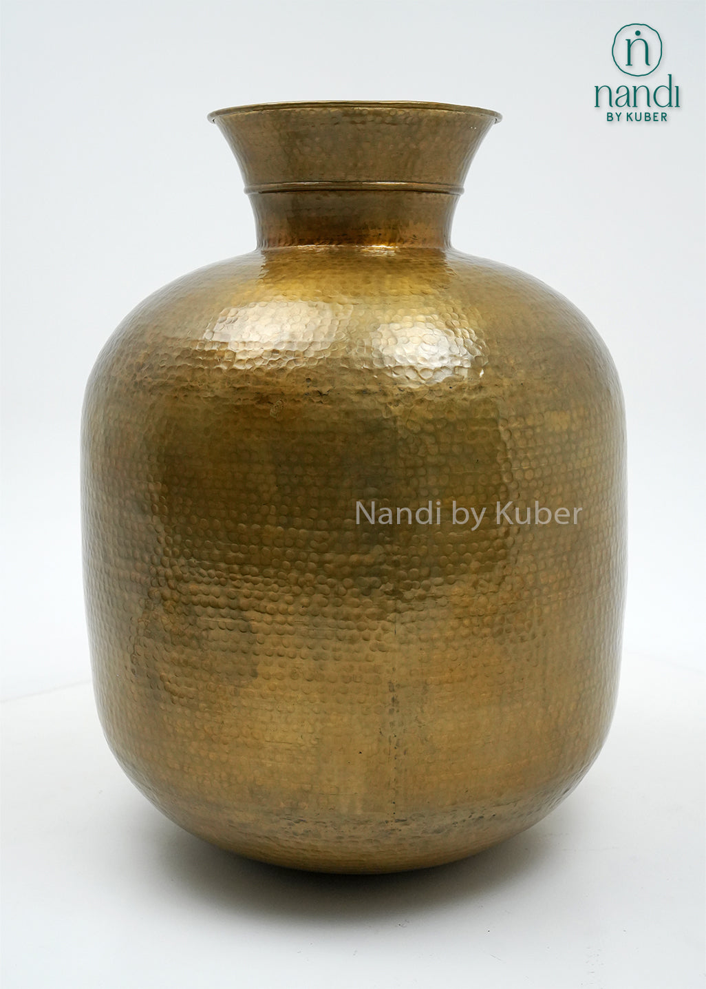Decorative hammered aluminium planter vase with an antique gold finish, perfect for displaying plants and enhancing modern or rustic interiors.