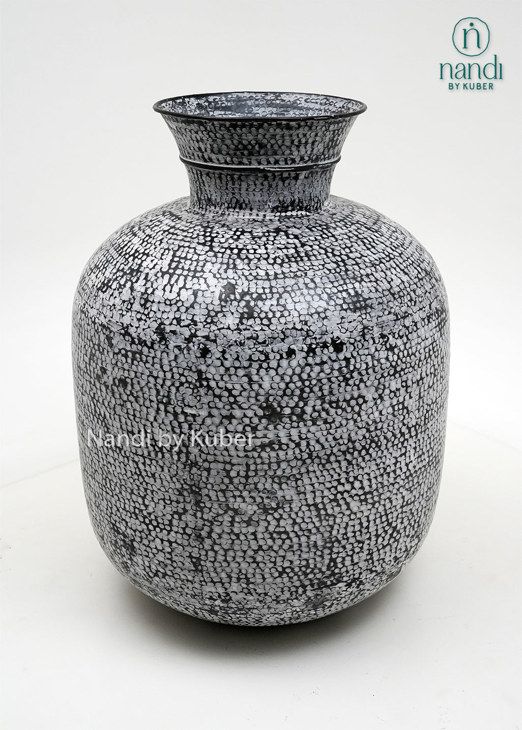 Decorative hammered aluminium planter vase with an antique smoke finish, perfect for displaying plants and enhancing modern or rustic interiors.