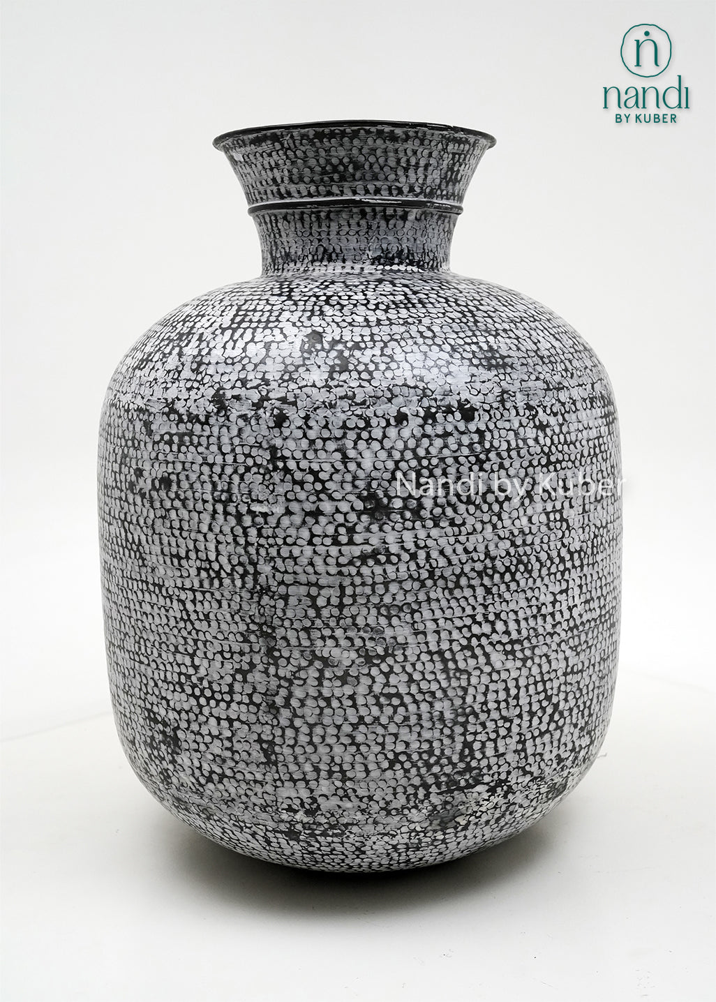 Decorative hammered aluminium planter vase with an antique smoke finish, perfect for displaying plants and enhancing modern or rustic interiors.