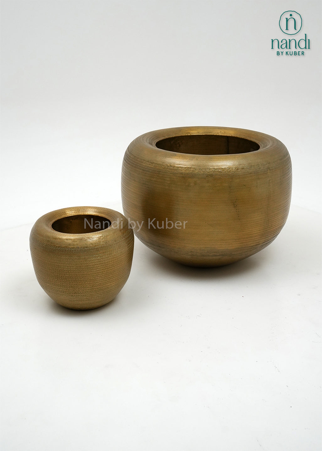 Handcrafted aluminium planter set with a textured copper , perfect for elevating plants and décor with timeless elegance.