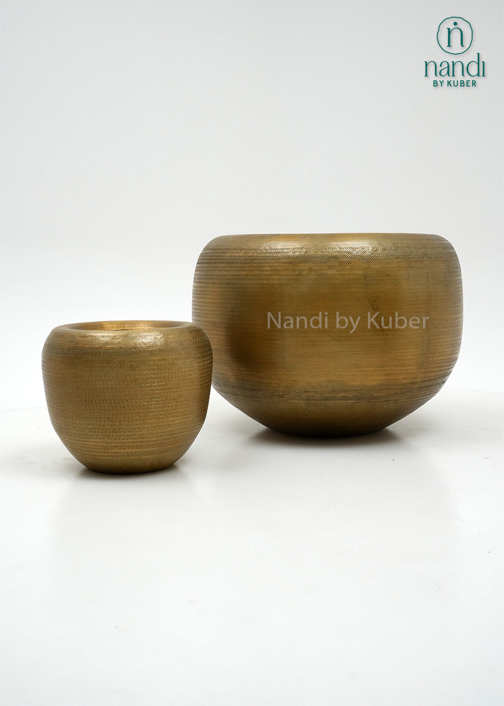 Handcrafted aluminium planter set with a textured copper , perfect for elevating plants and décor with timeless elegance.