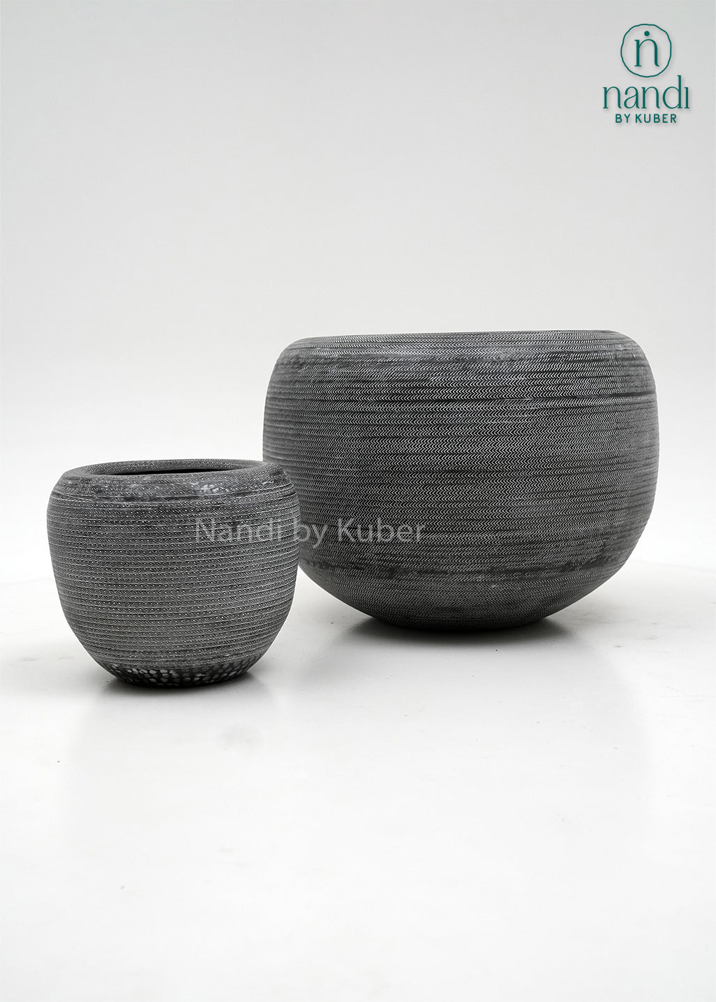 Handcrafted aluminium planter set with a textured copper , perfect for elevating plants and décor with timeless elegance.