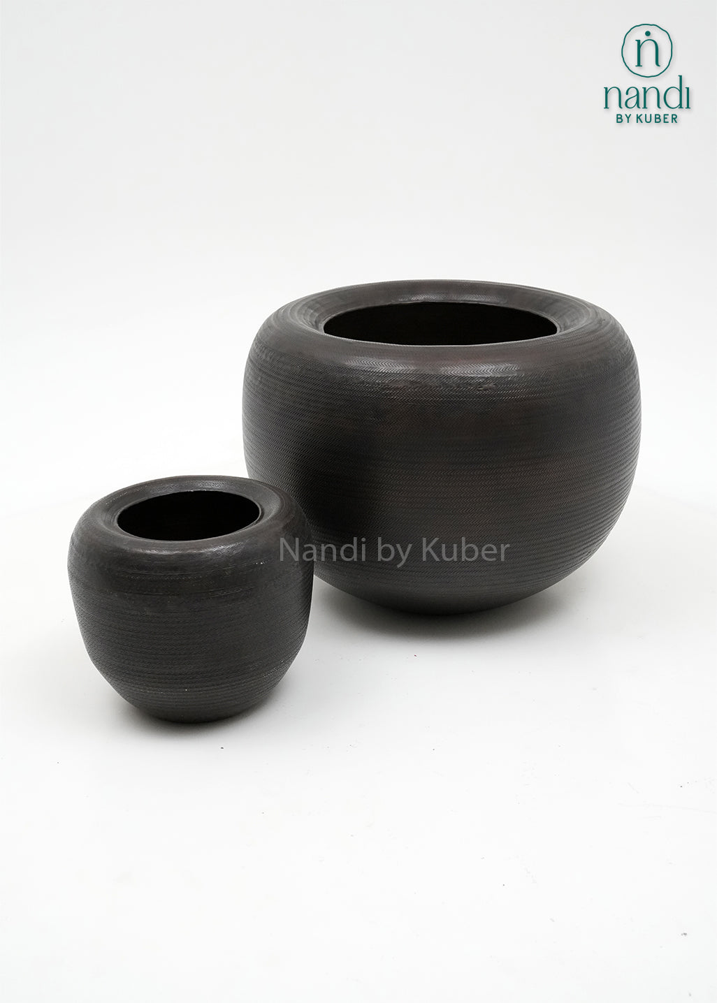Handcrafted aluminium planter set with a textured copper , perfect for elevating plants and décor with timeless elegance.