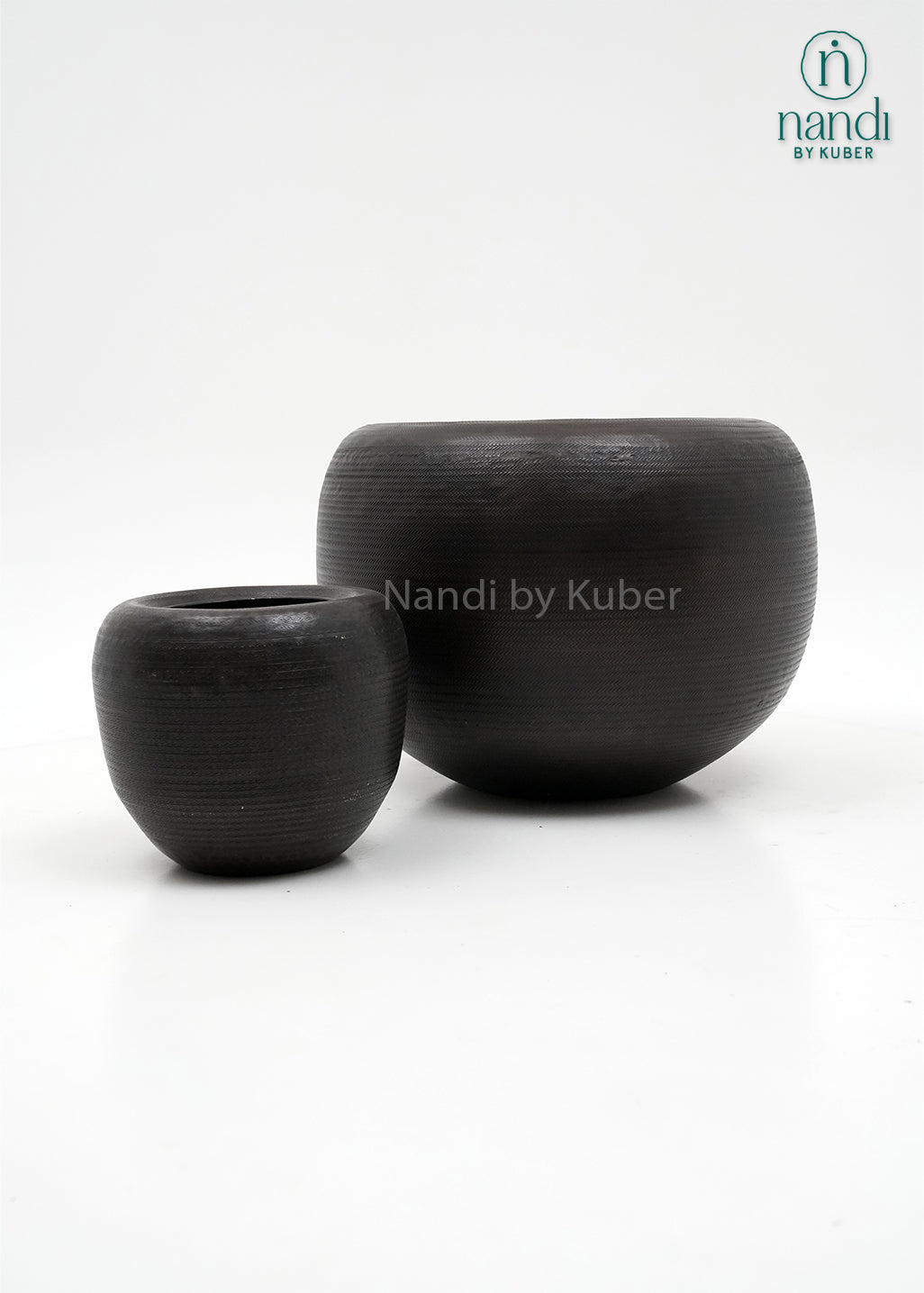 Handcrafted aluminium planter set with a textured copper , perfect for elevating plants and décor with timeless elegance.