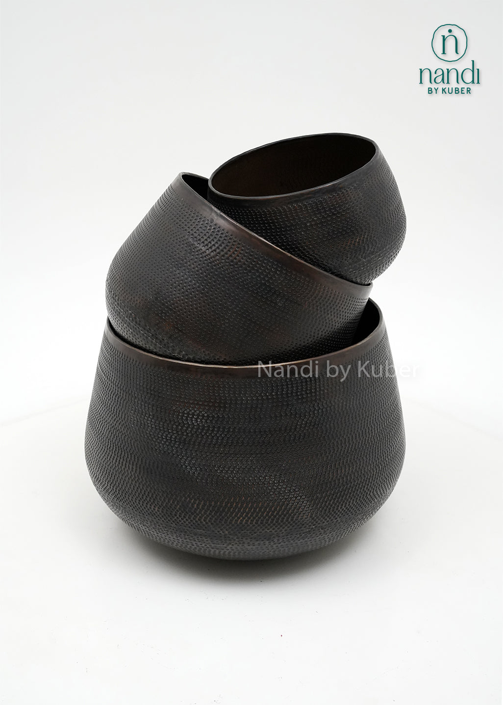 Handcrafted aluminium planter set with a textured copper, perfect for elevating plants and décor with timeless elegance.