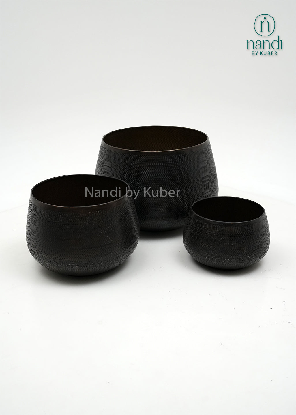 Handcrafted aluminium planter set with a textured copper , perfect for elevating plants and décor with timeless elegance.