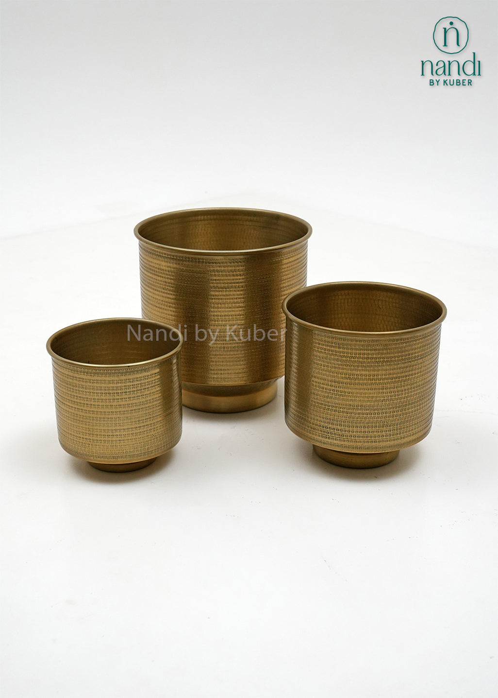 Handcrafted aluminium planter set with a textured copper , perfect for elevating plants and décor with timeless elegance.