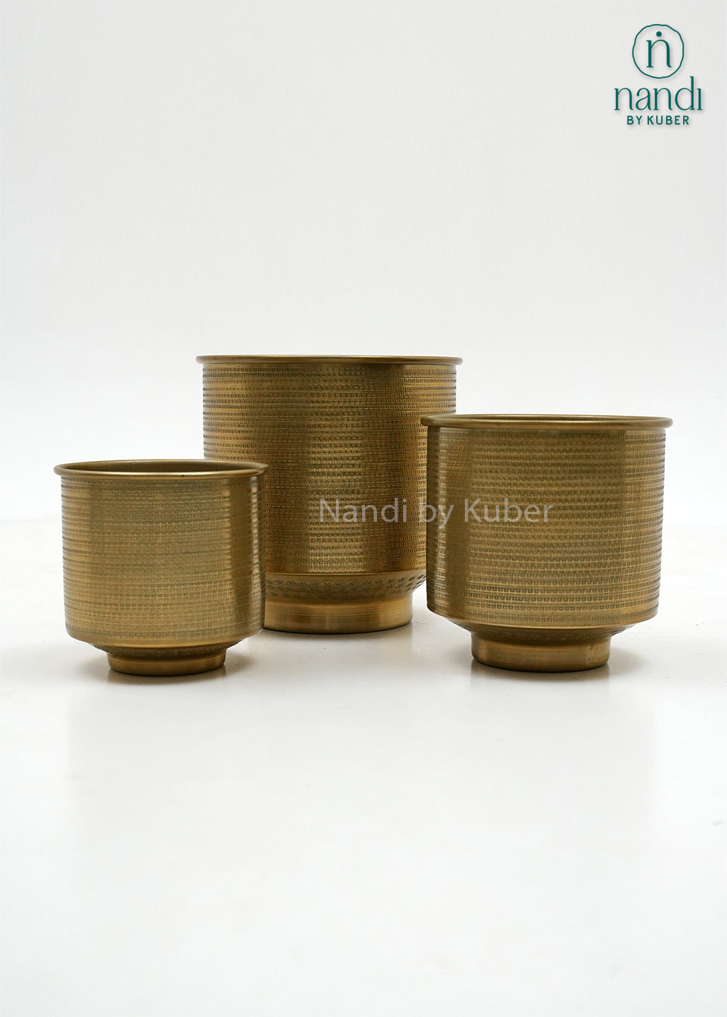 Handcrafted aluminium planter set with a textured copper , perfect for elevating plants and décor with timeless elegance.