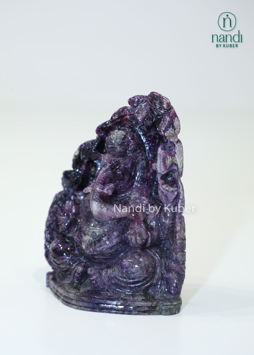 Handcrafted Amethyst Stone Ganesha sculpture featuring rich purple tones, symbolizing wisdom, prosperity, and positive energy while enhancing any sacred or decorative space.