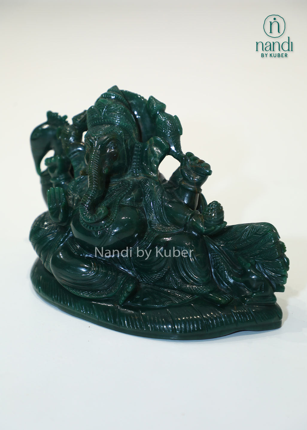 Australian jade reclining Ganesha statue, natural green gemstone Lord Ganesh idol for Vastu, prosperity, success, spiritual décor, meditation space, home temple, office decoration, and auspicious gifting.