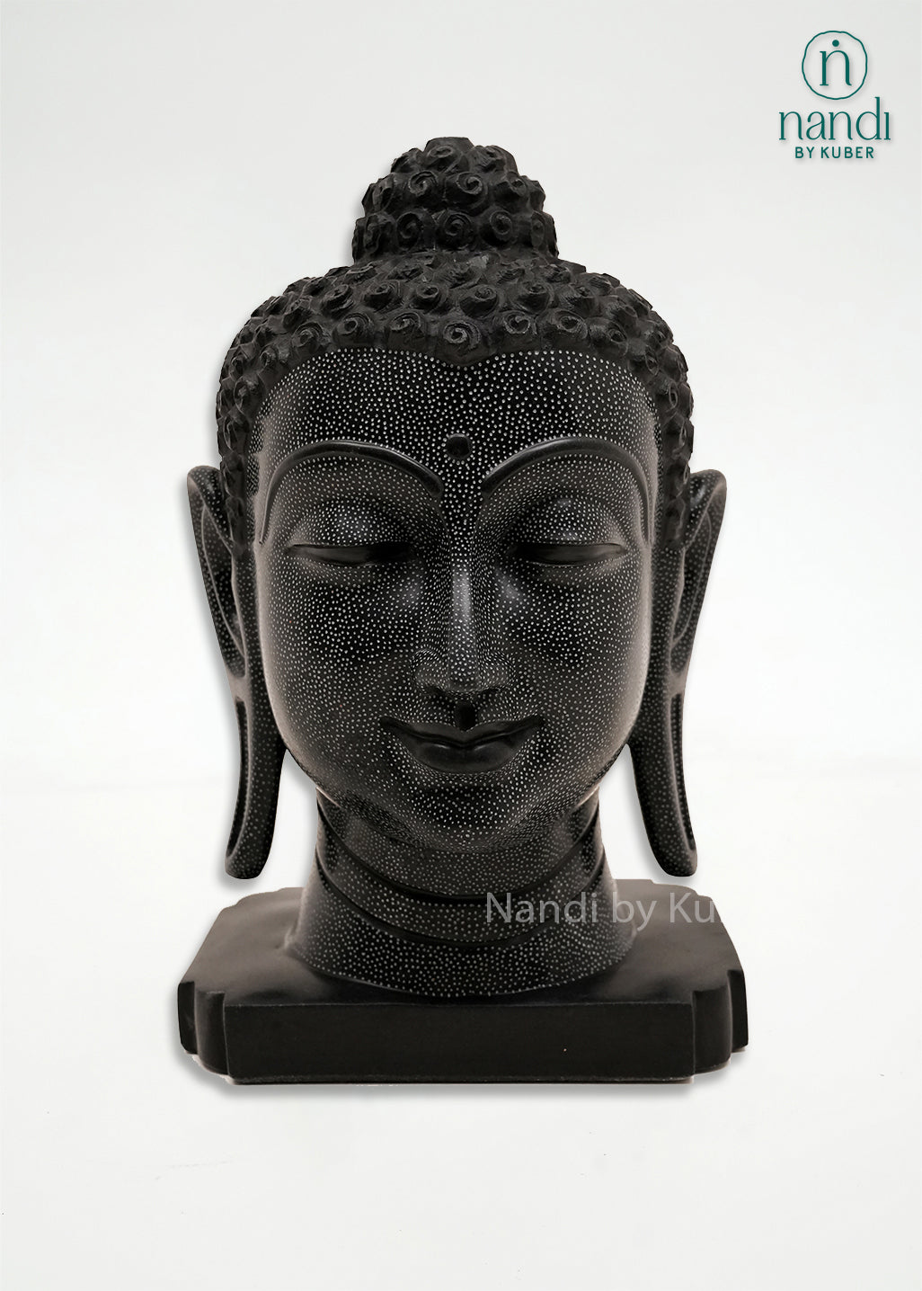 Handcrafted black marble Buddha head statue with peaceful meditative expression, intricate carved detailing, and elegant black finish, ideal for home décor, meditation spaces, spiritual interiors, and gifting.