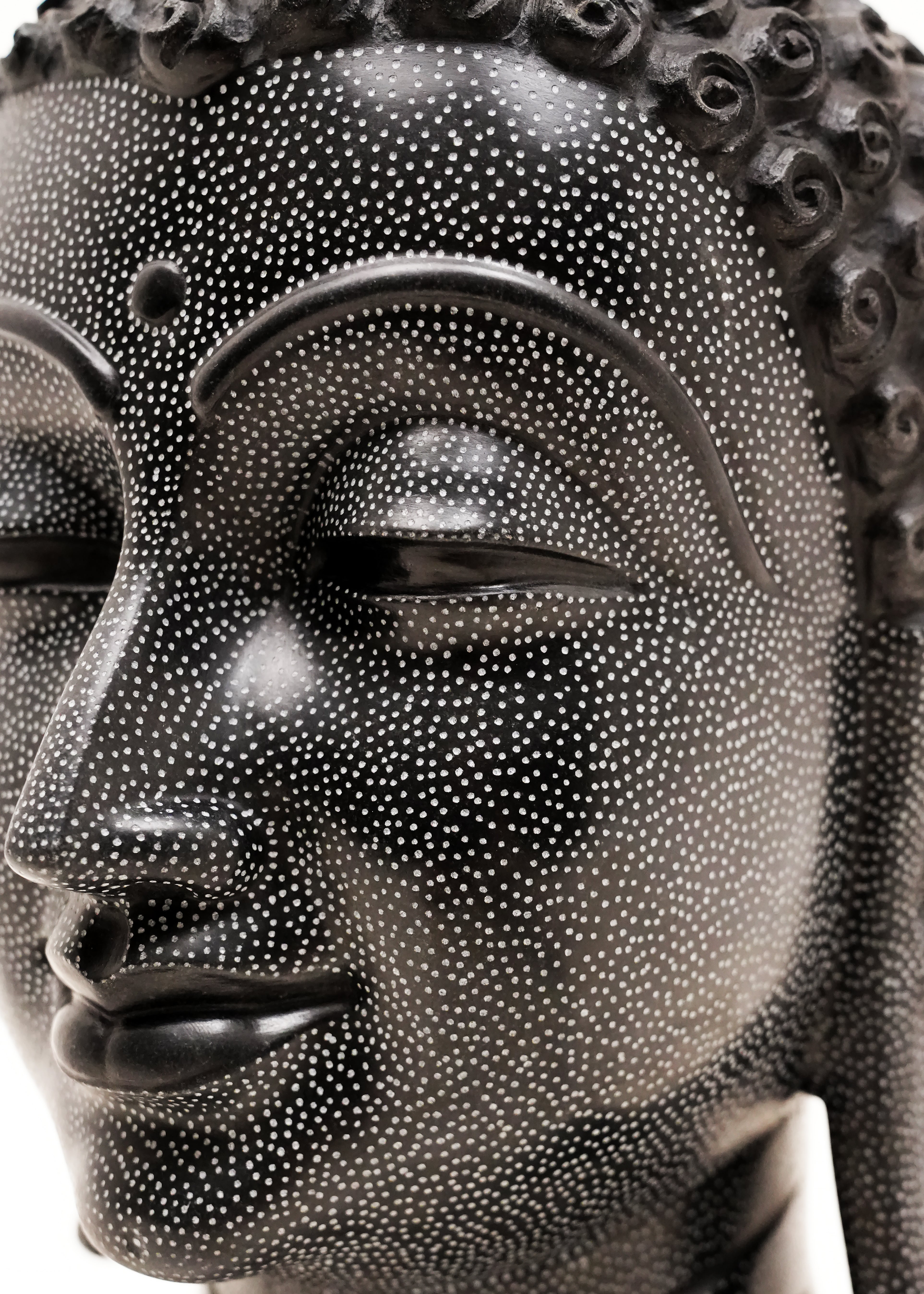 Handcrafted black marble Buddha head statue with peaceful meditative expression, intricate carved detailing, and elegant black finish, ideal for home décor, meditation spaces, spiritual interiors, and gifting.