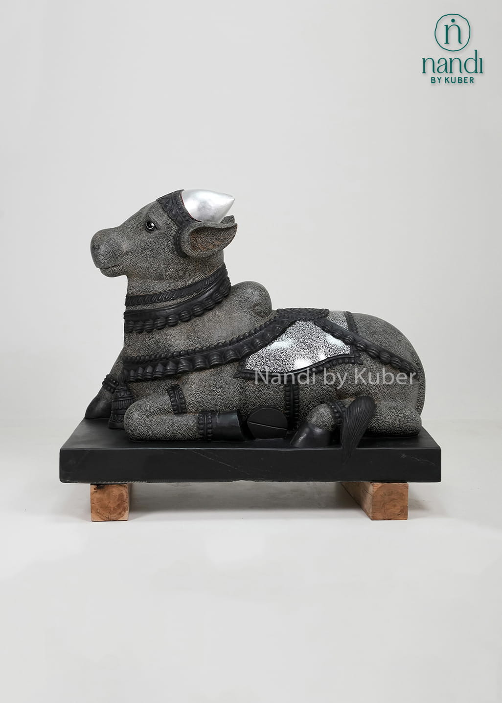 Black marble seated Nandi statue