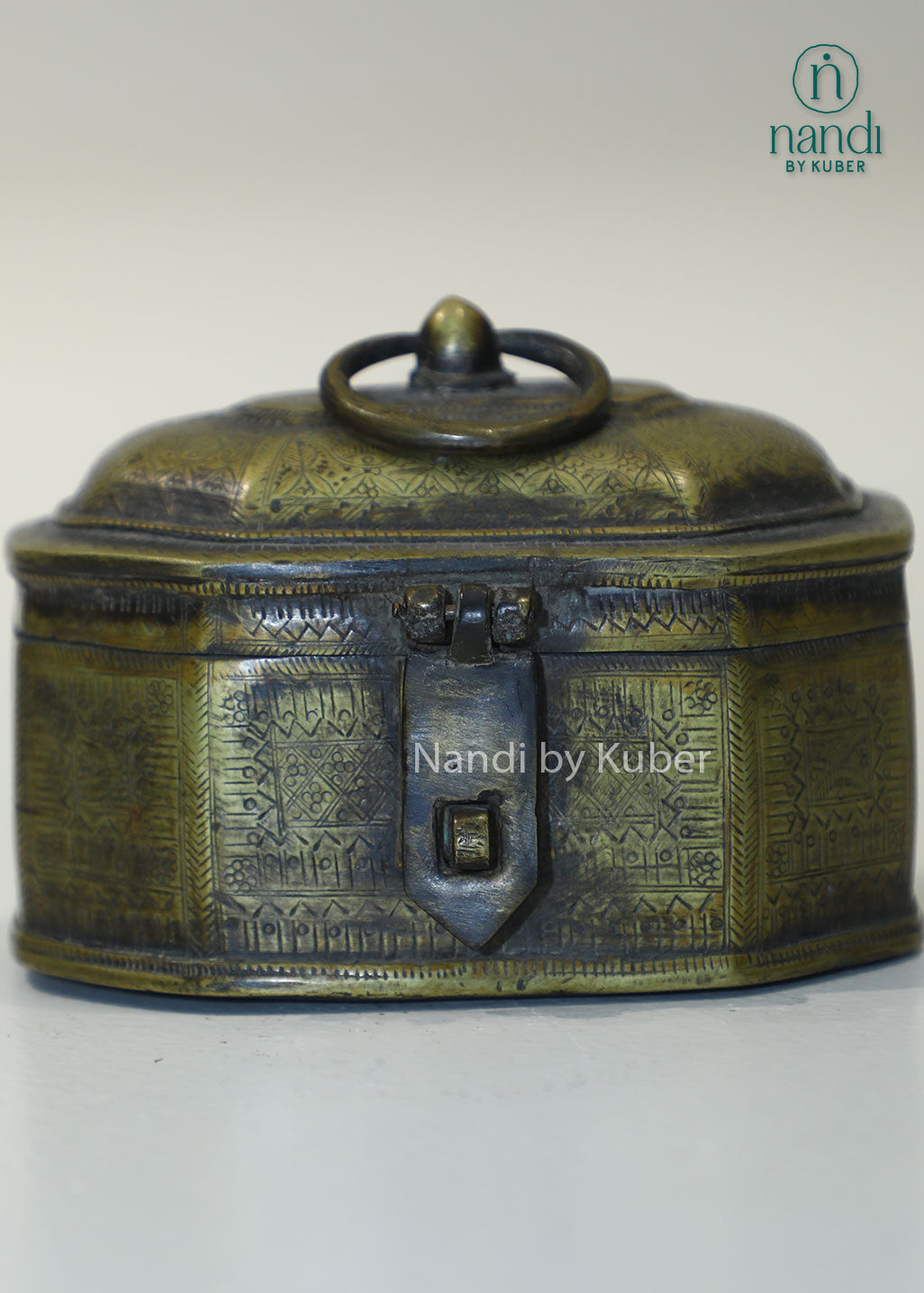 Antique brass jewelry box with engraved detailing, handcrafted storage chest for trinkets, keepsakes, coins, accessories, vintage home décor, gifting, and traditional Indian craftsmanship.