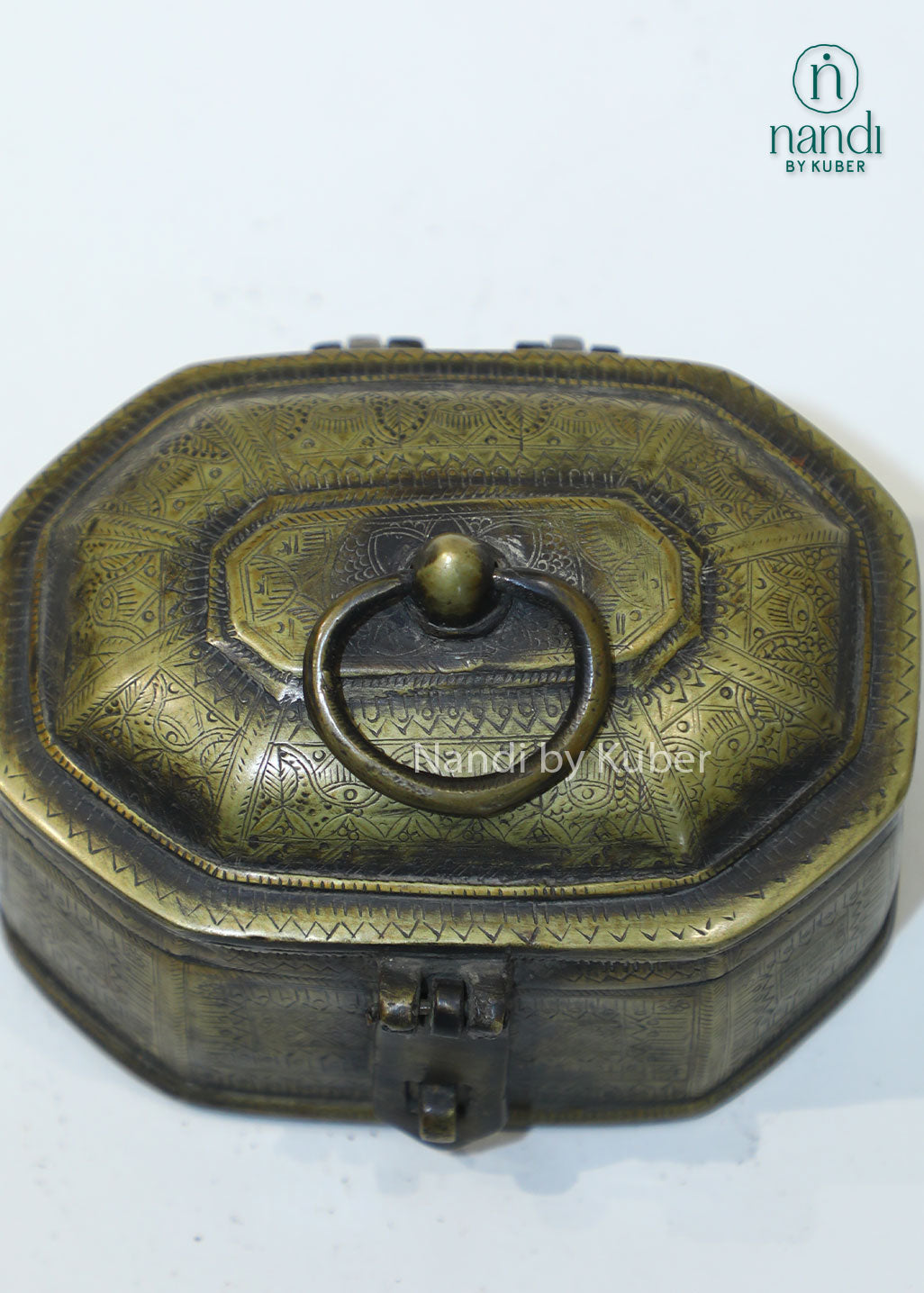 Antique brass jewelry box with engraved detailing, handcrafted storage chest for trinkets, keepsakes, coins, accessories, vintage home décor, gifting, and traditional Indian craftsmanship.