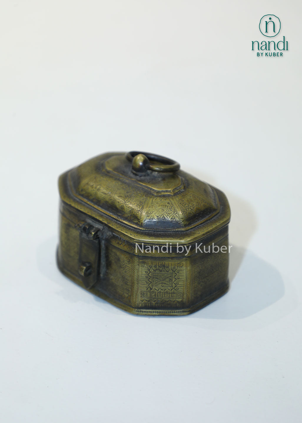 Antique brass jewelry box with engraved detailing, handcrafted storage chest for trinkets, keepsakes, coins, accessories, vintage home décor, gifting, and traditional Indian craftsmanship.