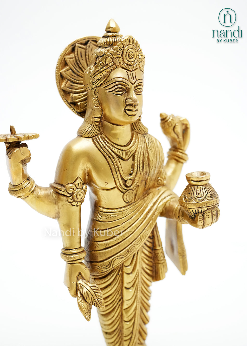 Handcrafted brass Dhanvantari idol with ornate gold finish, detailed robes, sacred symbols, and amrita kalash, ideal for pooja rooms, Ayurvedic healing spaces, temples, and spiritual home décor.