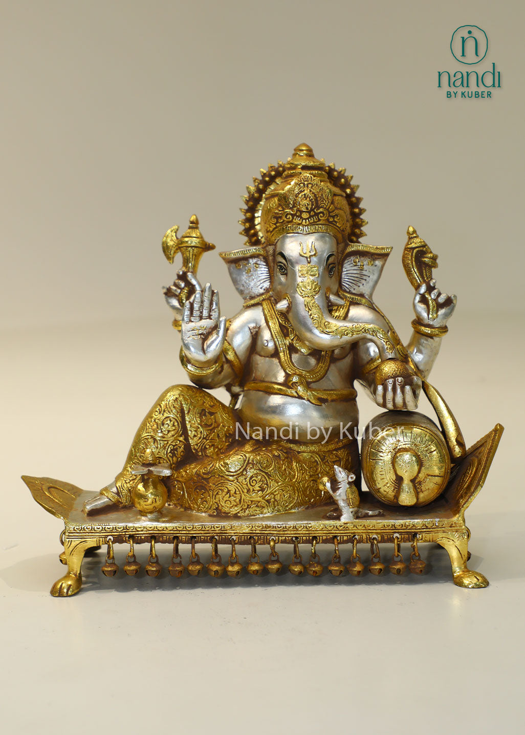 Brass reclining Ganesha idol with handcrafted Lord Ganesh statue for home temple, puja room décor, spiritual gifting, Vastu decoration, Hindu religious collectible, and festive worship.