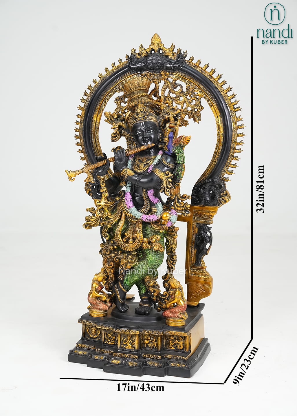 Decorative brass Krishna statue with ornate arch, flute, and multicolor detailing
