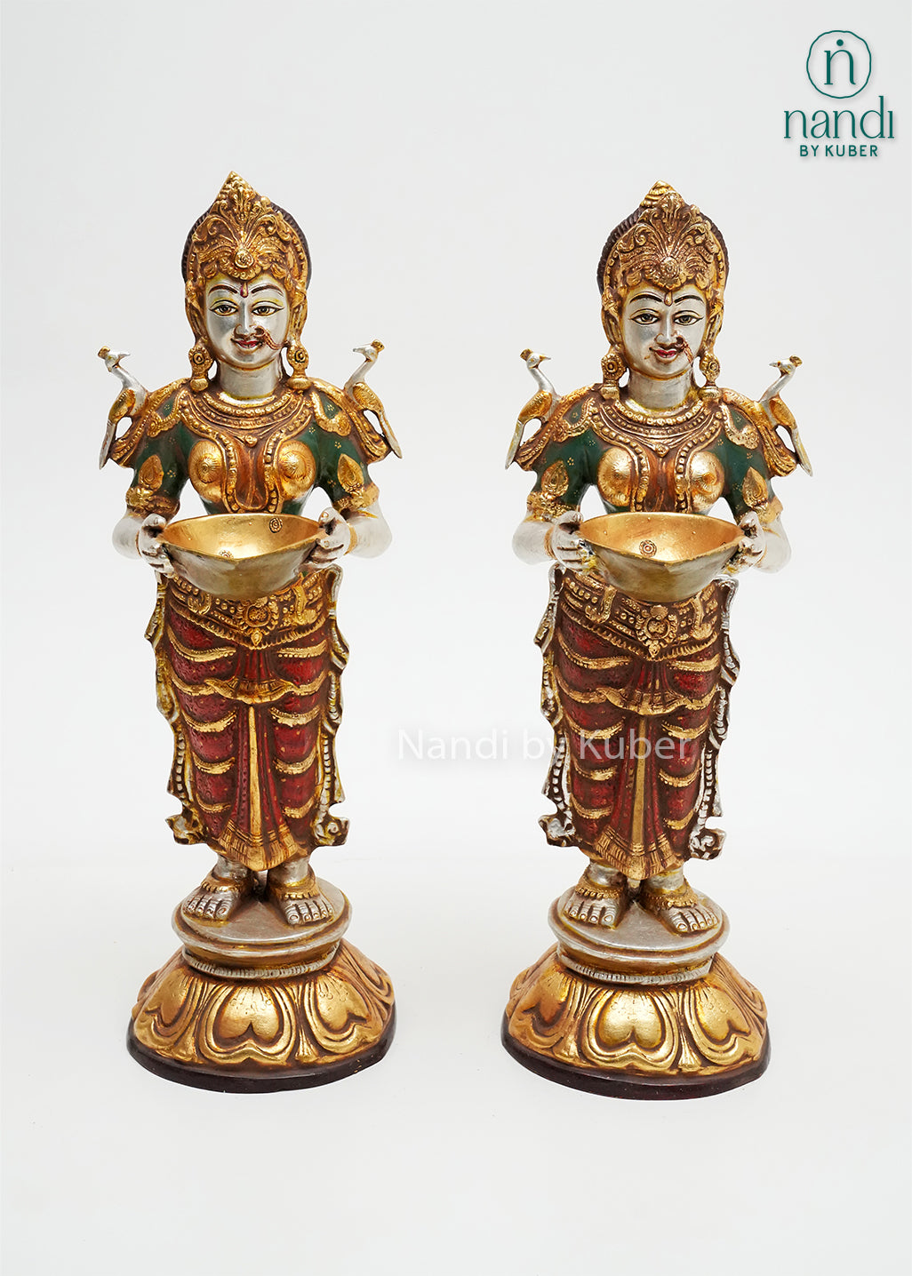 Handcrafted pair of Goddess Lakshmi idol statues with lotus bases, decorative offering bowls, and rich gold-tone detailing, ideal for Diwali décor, pooja rooms, temples, and spiritual home interiors.