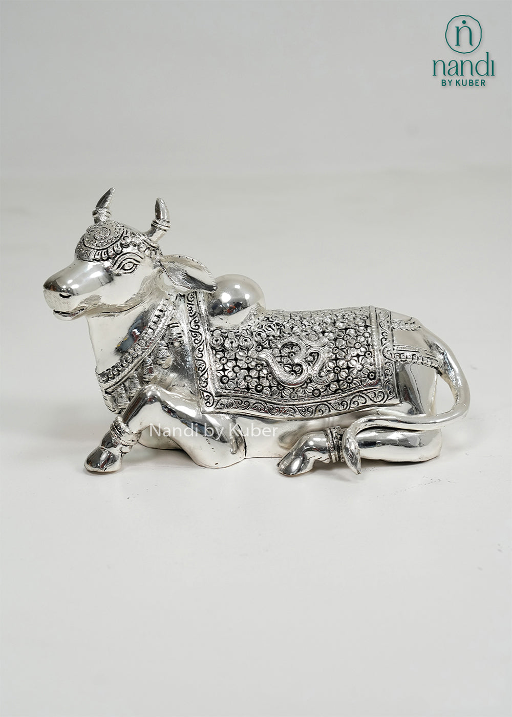 Silver Nandi bull statue with Om carving and intricate detailing