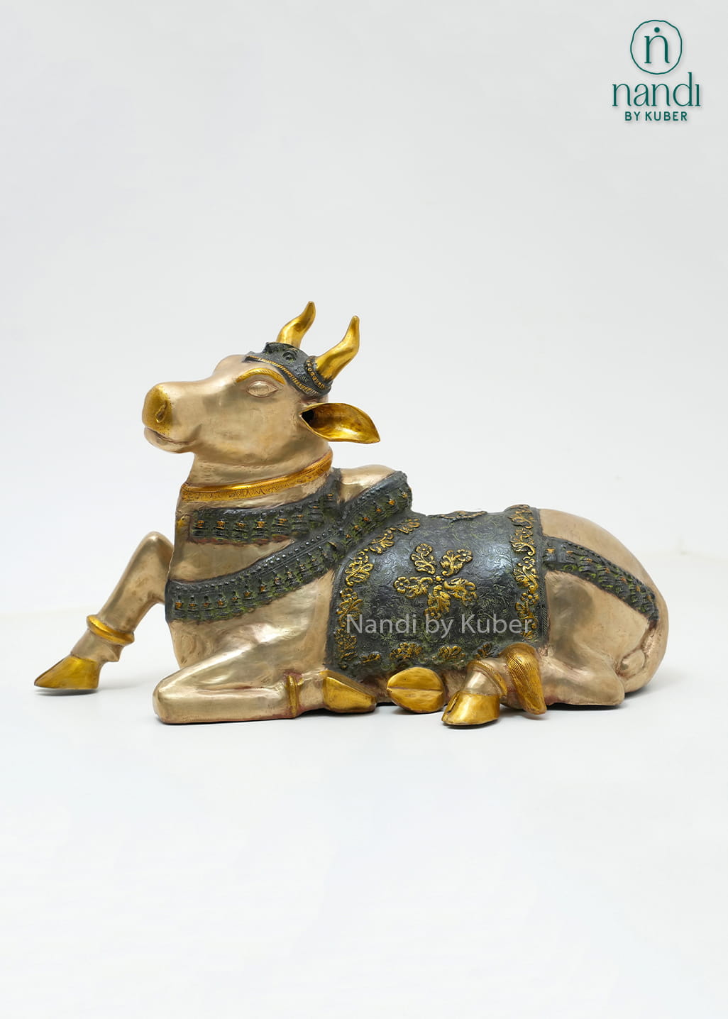 Decorative brass Lord Ganesha statue with a royal pagdi design, intricate detailing, and an elegant antique finish symbolizing wisdom, prosperity, and good fortune.
