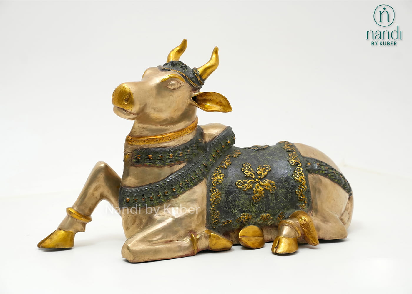 Decorative brass Lord Ganesha statue with a royal pagdi design, intricate detailing, and an elegant antique finish symbolizing wisdom, prosperity, and good fortune.