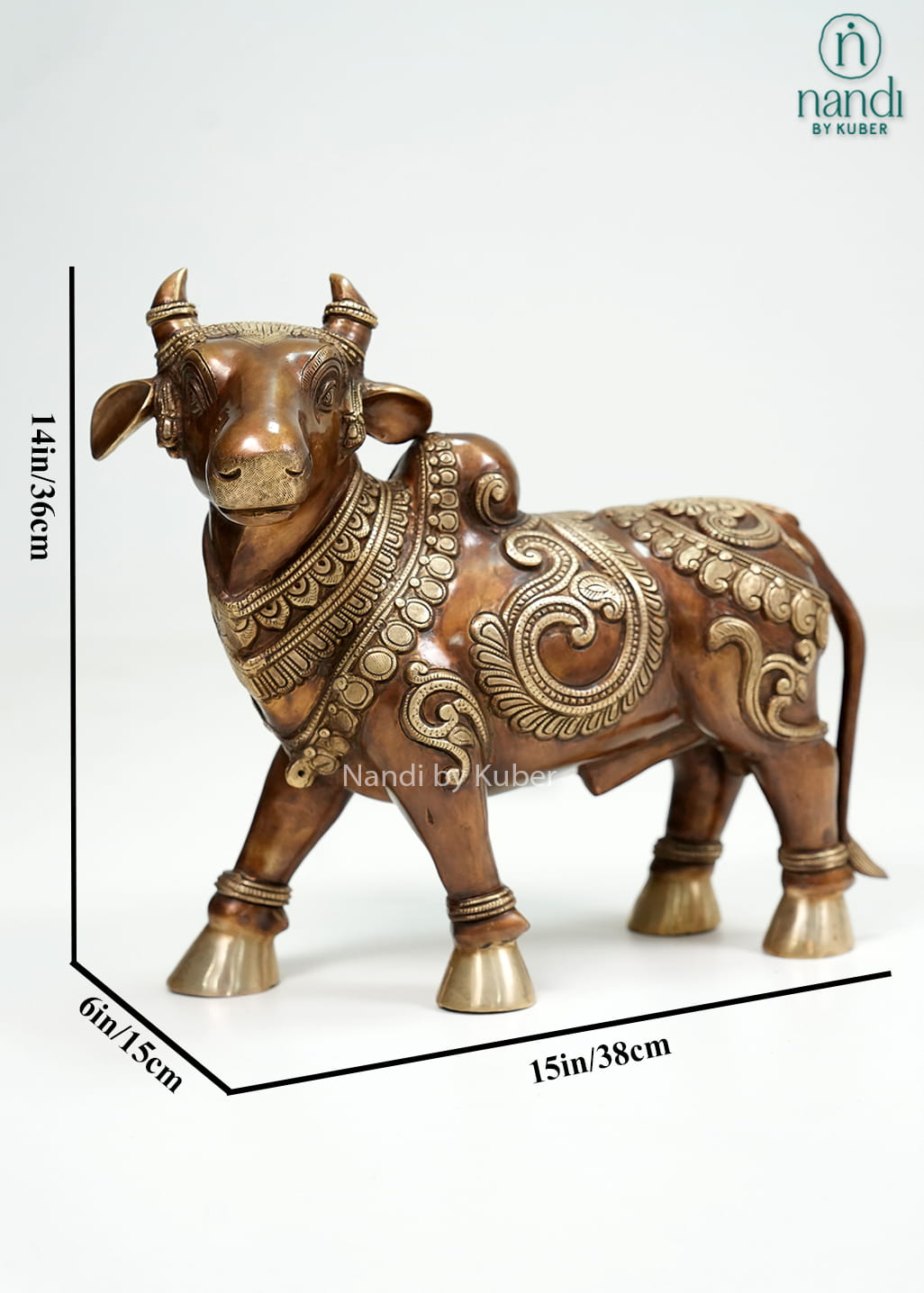 Two-tone brass Nandi bull statue with intricate carvings