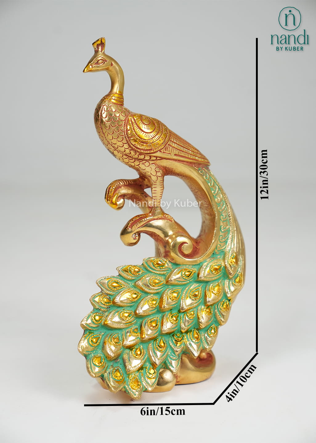 Brass peacock on decorative branch with enamel tail detailing