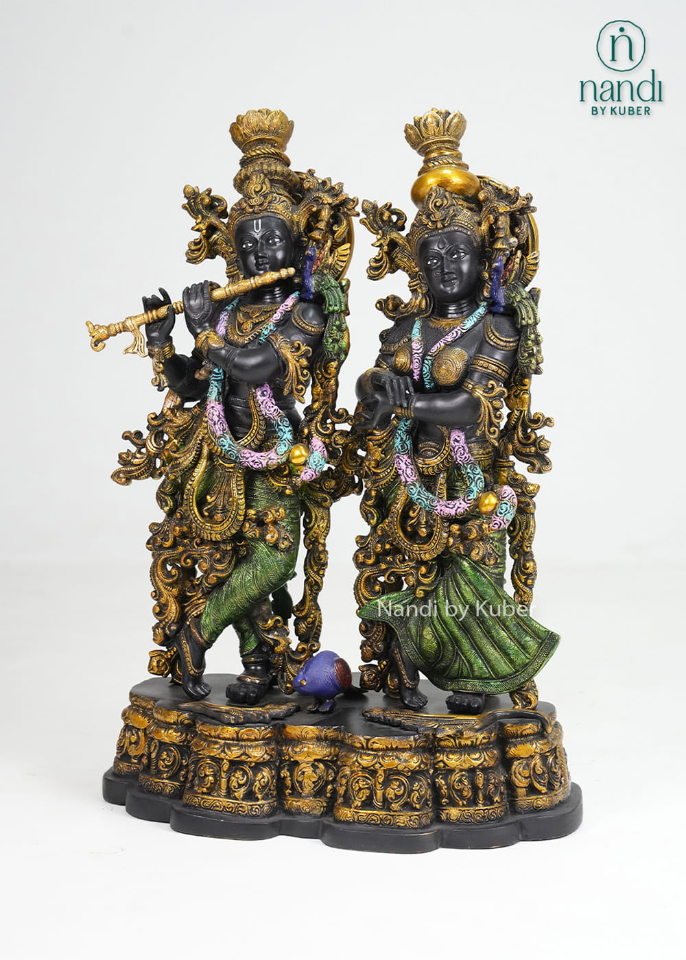 Brass Radha Krishna idol set with flute, ornate detailing, and multicolor accents