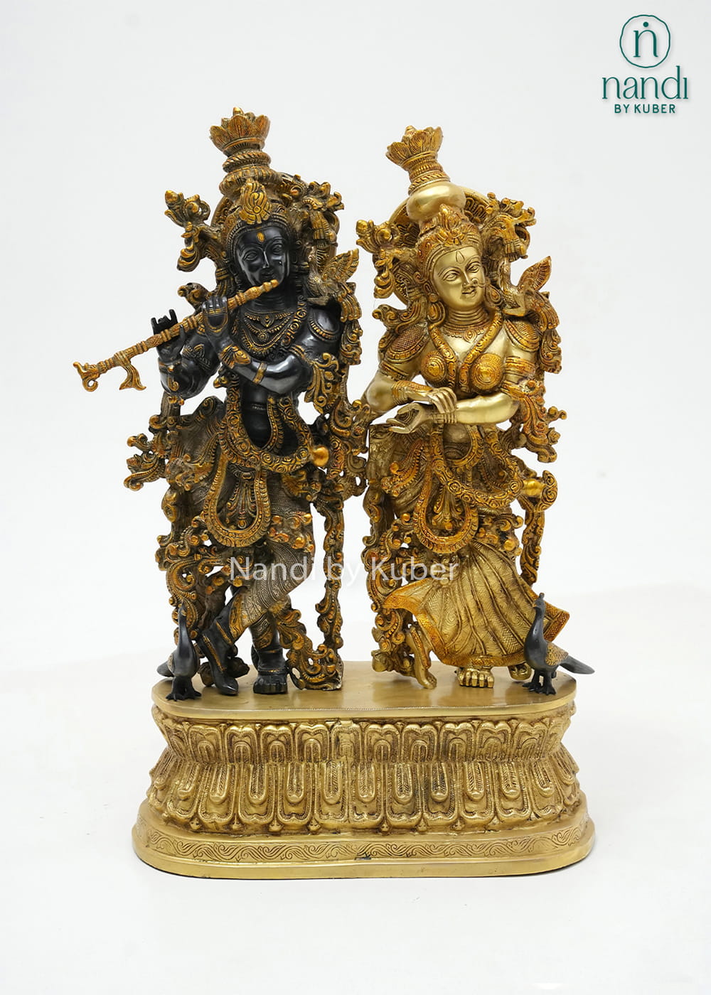 Decorative three-tone brass Radha Krishna statue on a lotus pedestal, beautifully crafted to symbolize love, devotion, and harmony.