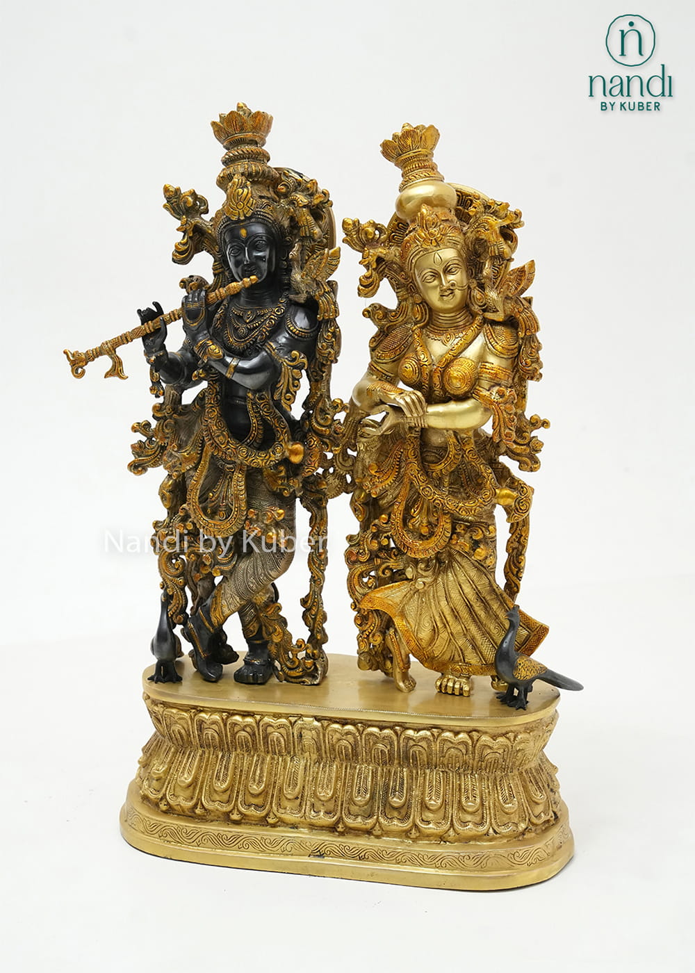 Decorative three-tone brass Radha Krishna statue on a lotus pedestal, beautifully crafted to symbolize love, devotion, and harmony.