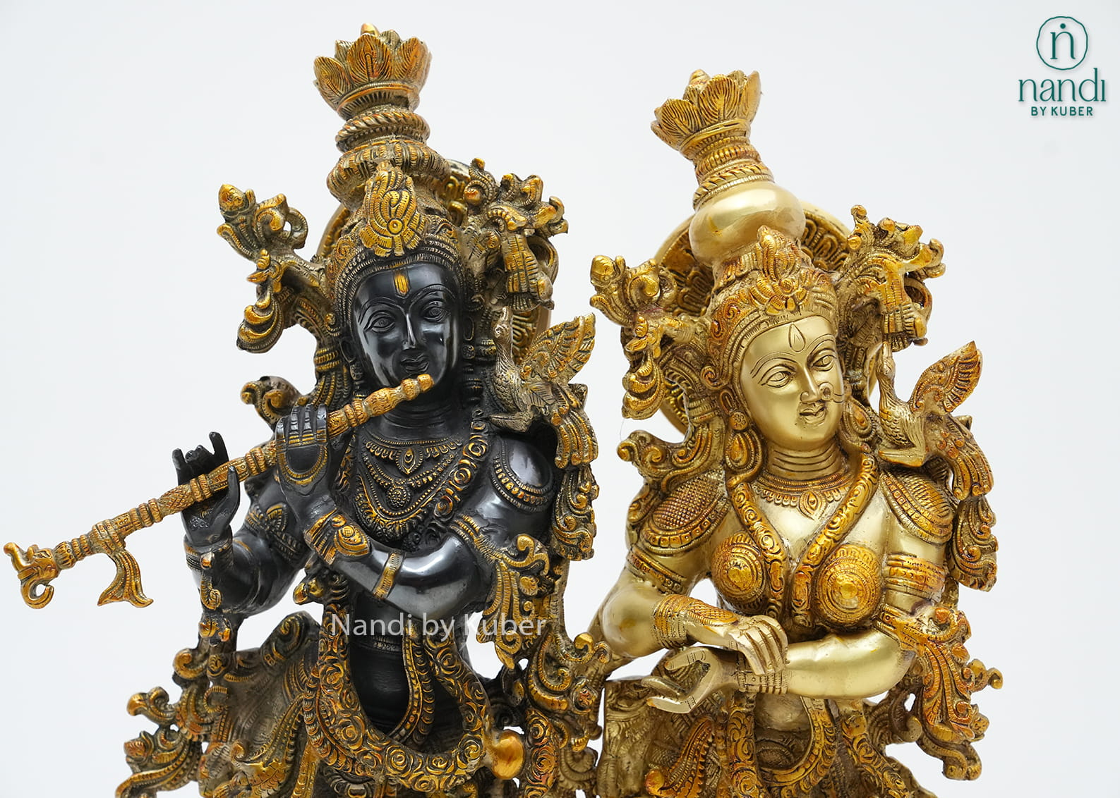 Decorative three-tone brass Radha Krishna statue on a lotus pedestal, beautifully crafted to symbolize love, devotion, and harmony.