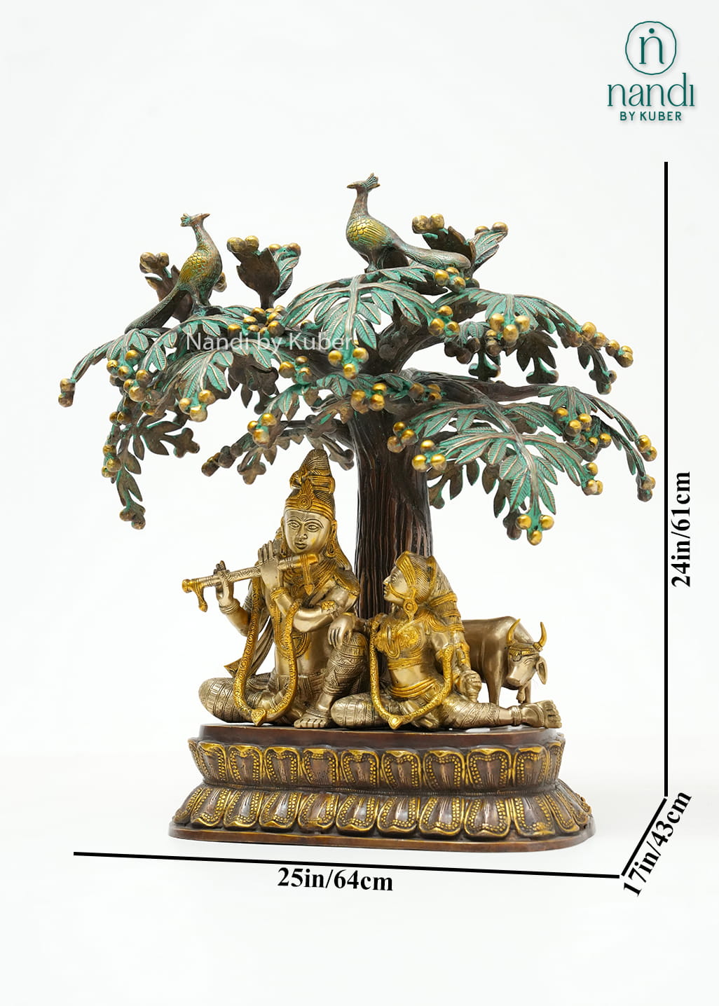 Decorative three-tone brass Radha Krishna statue beneath an ornate tree with peacocks, symbolizing love, devotion, and harmony.